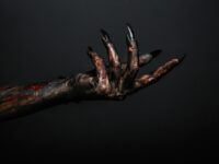 Close-up of scary monster hand