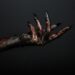 Close-up of scary monster hand