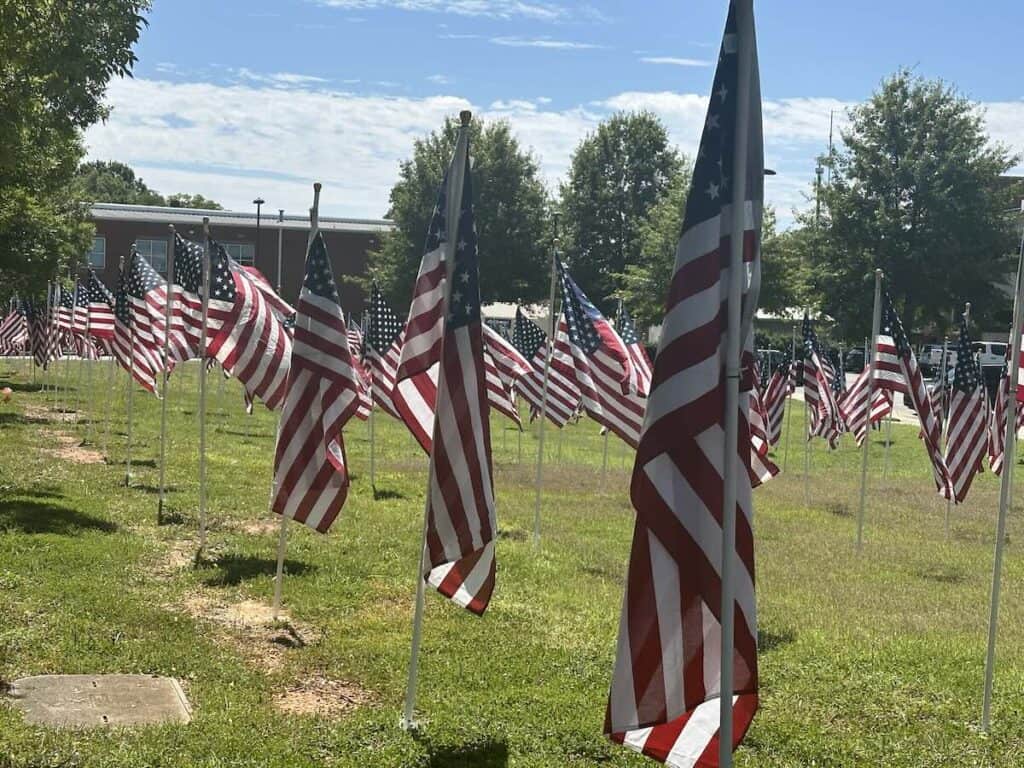 flags in field in Concord, NC