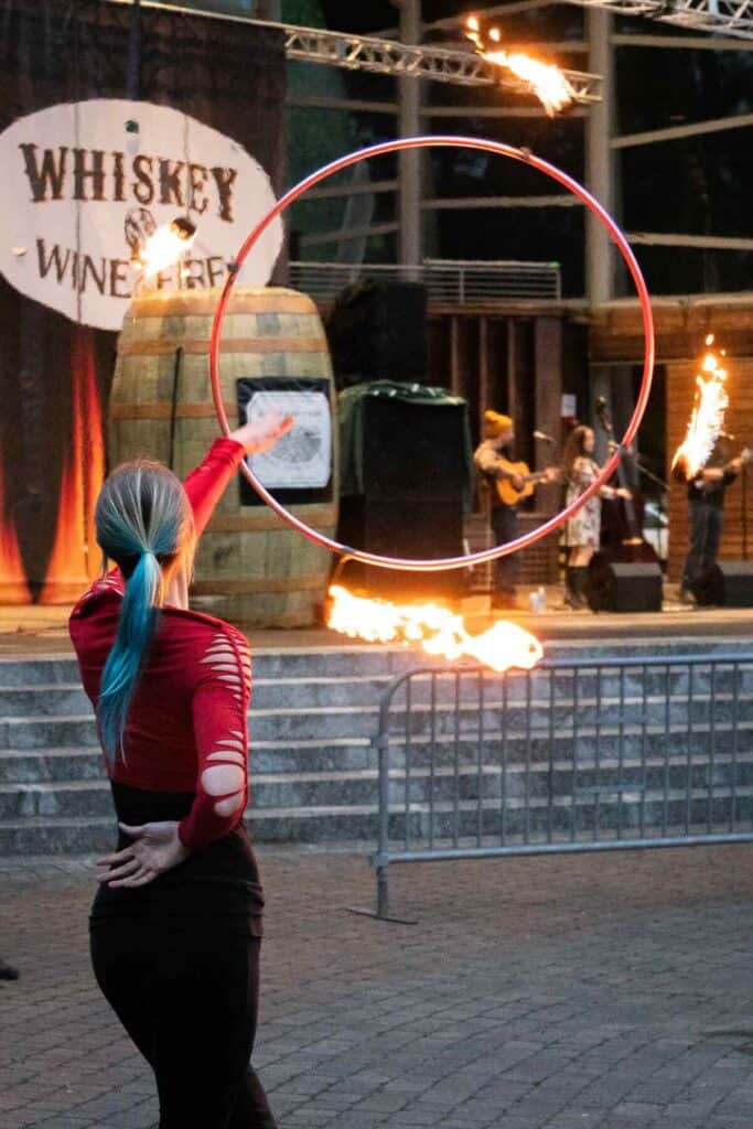performer with ring and fire