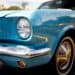 Close up view of blue classic American muscle car at vintage car show.