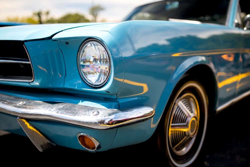 Close up view of blue classic American muscle car at vintage car show.