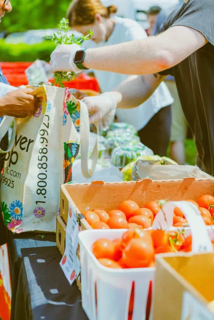 person shopping at farmers' market