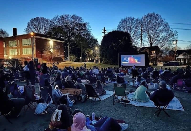 people watching an outdoor movie at Tom Sykes Rec Center in Charlotte