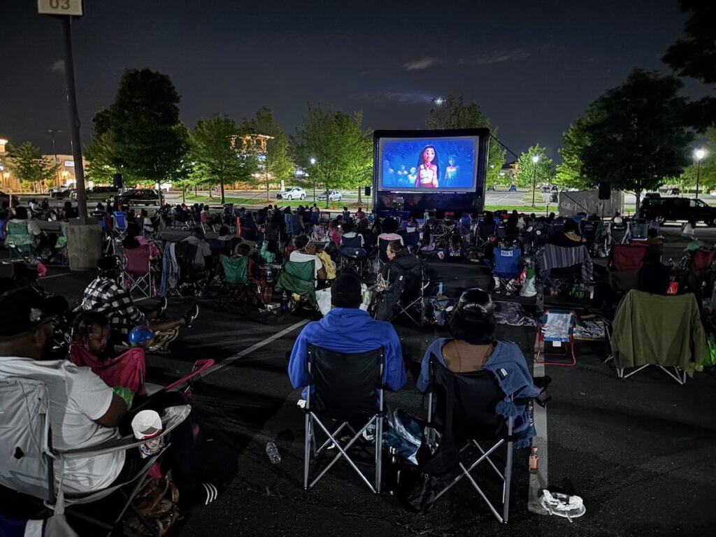 crowd watching an outdoor movie