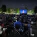 crowd watching an outdoor movie