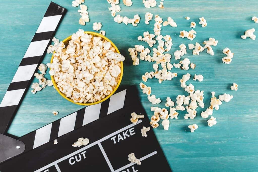 movie clapper and popcorn