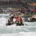 People riding homemade boat
