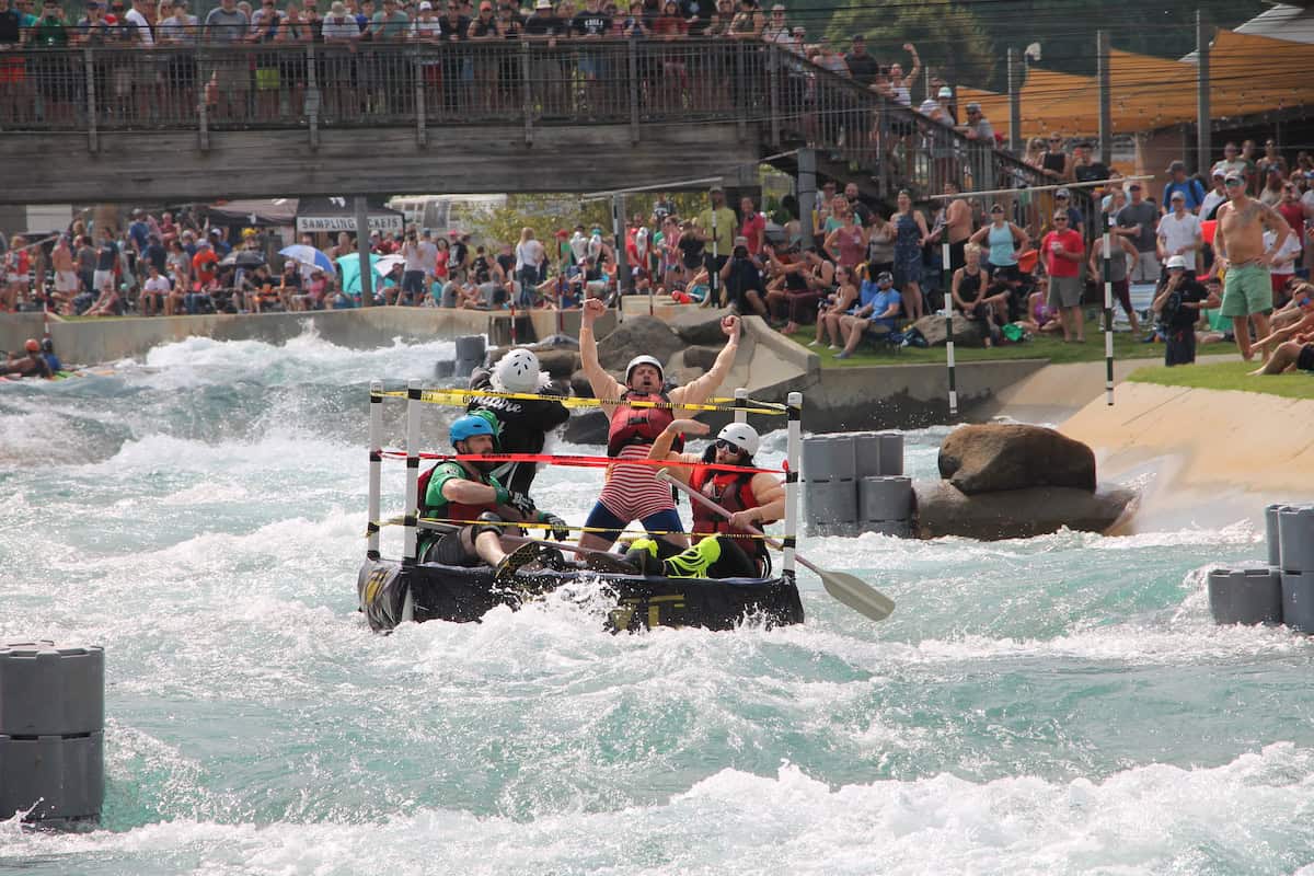 People riding homemade boat