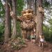 children looking at giant troll sculpture in Seattle