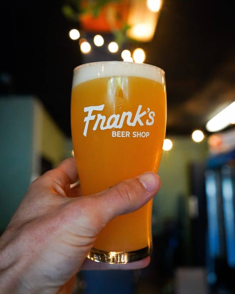 Pint glass with Frank's Beer Shop on it