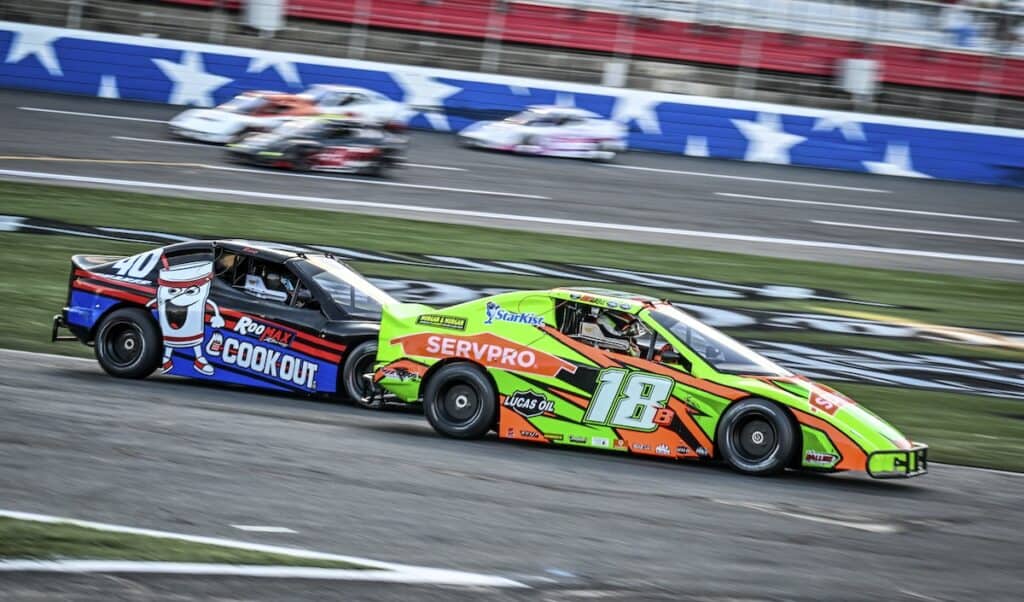 Cars racing on track during Cook Out Summer Shootout Series