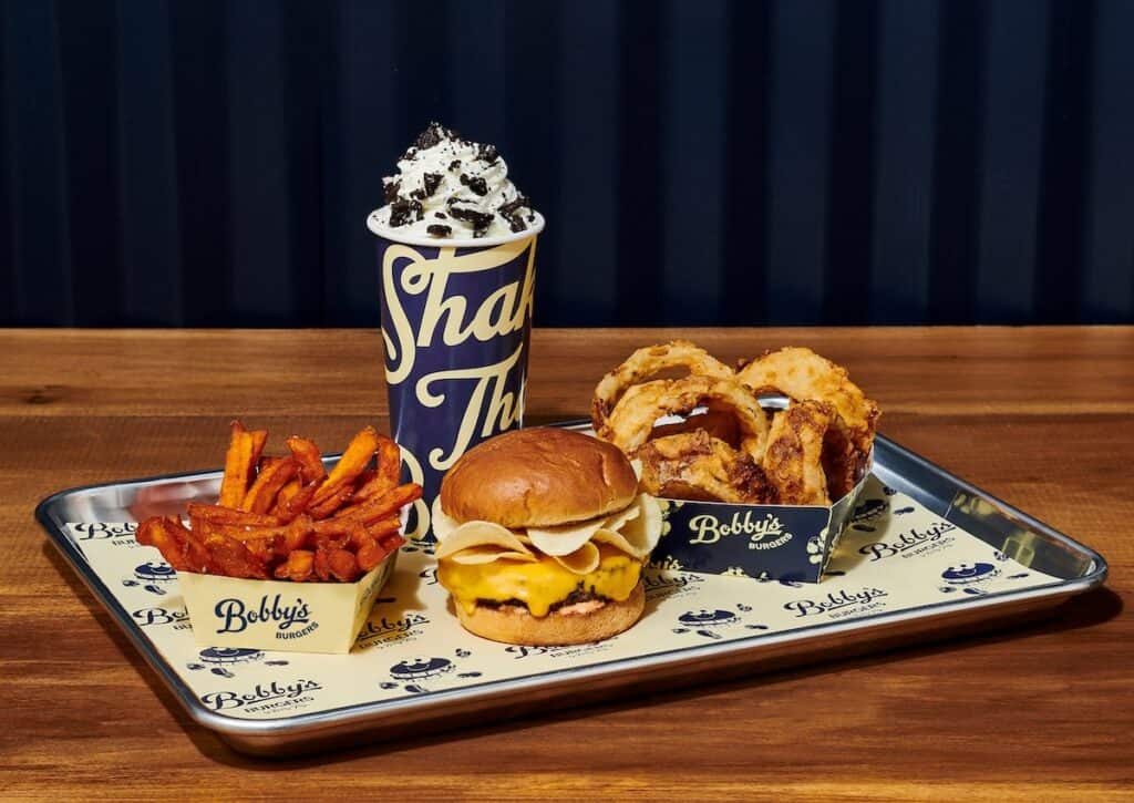 Tray with a burger and sides