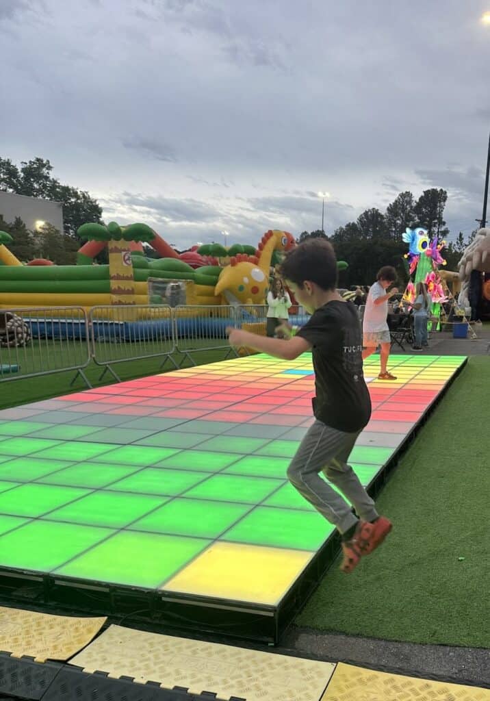 Jumping onto dino dance floor at Dino Safari