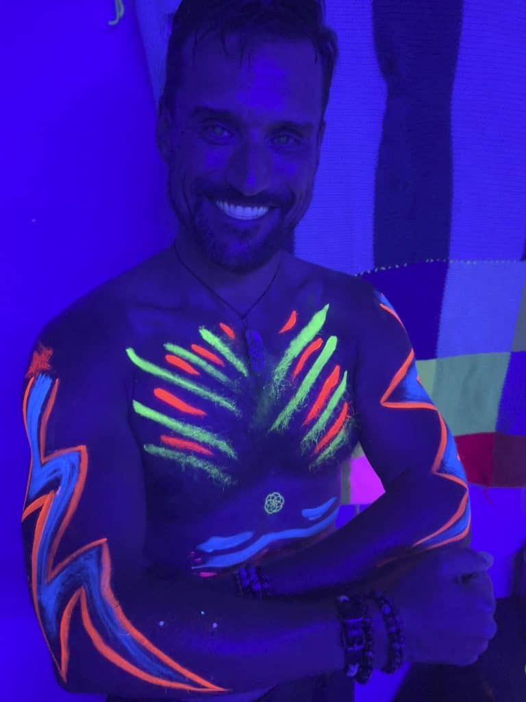 Main painted with body paint under black light