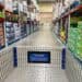 Interior of Sam's Club from behind a shopping cart on an aisle