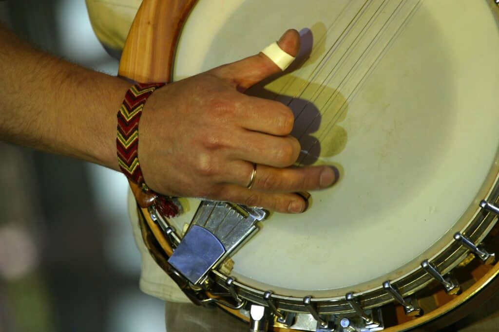 closeup of a banjo being played