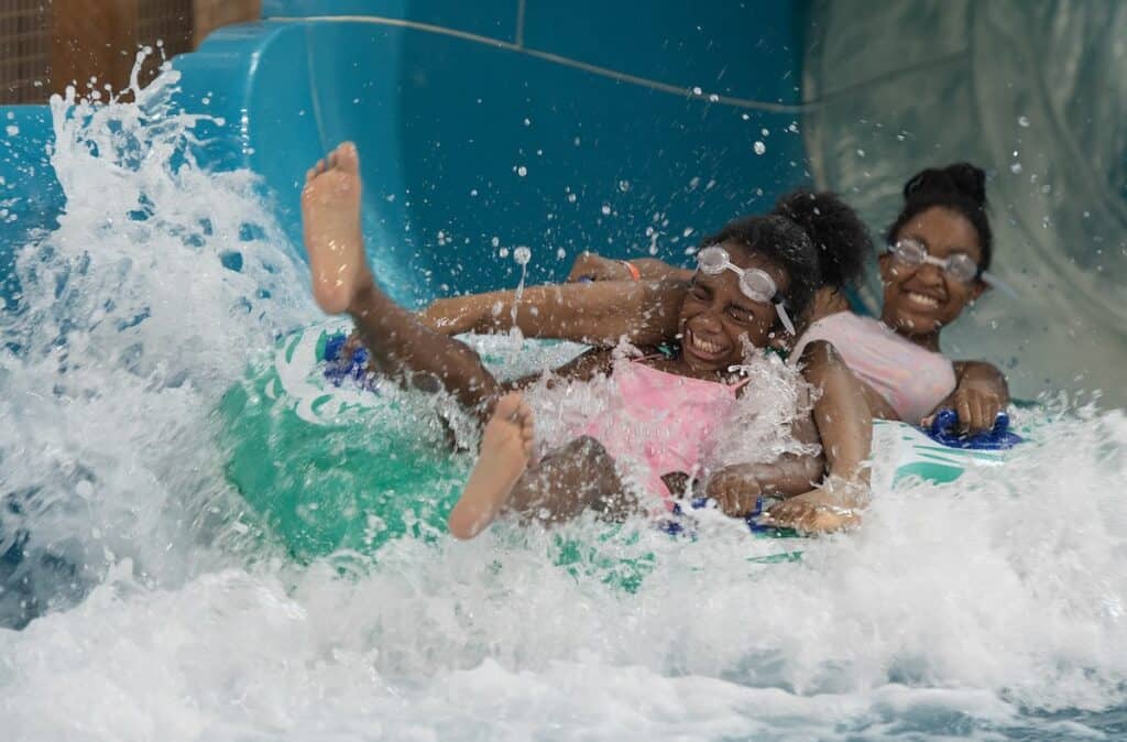 two people going down a water slide