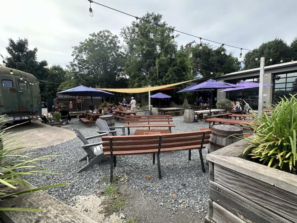 Patio of Town Brewing. Acoustic musician on stage