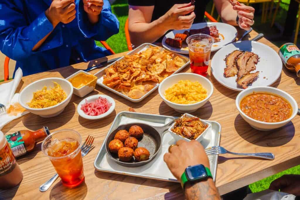 Sharing a meal at The Improper Pig