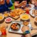 Sharing a meal at The Improper Pig