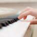 hand on piano keys