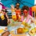 people with Coronas having a good time